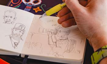 Personne réalisant un croquis.